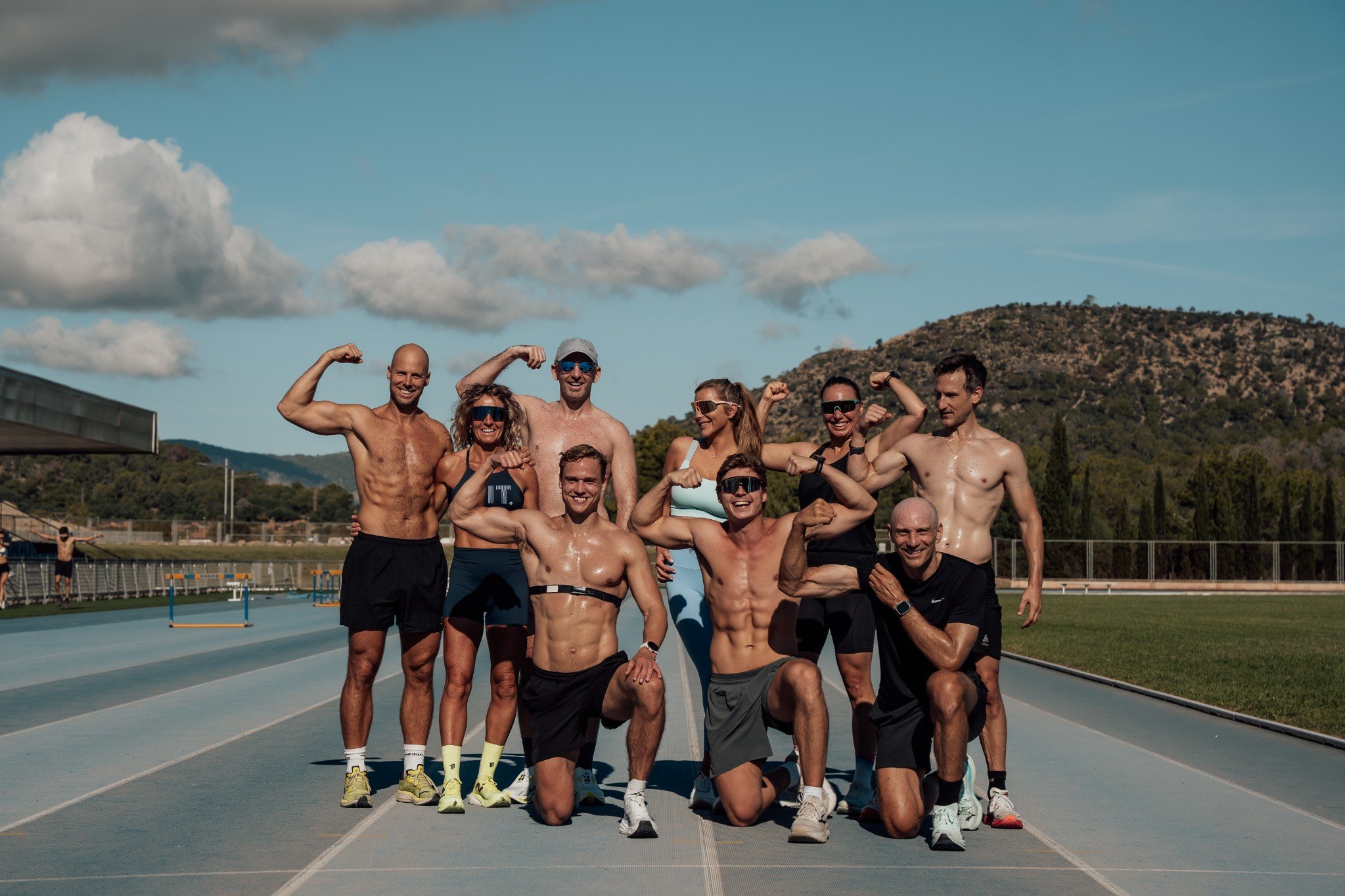 At First Light athletes celebrating together after training at our Mallorca camp